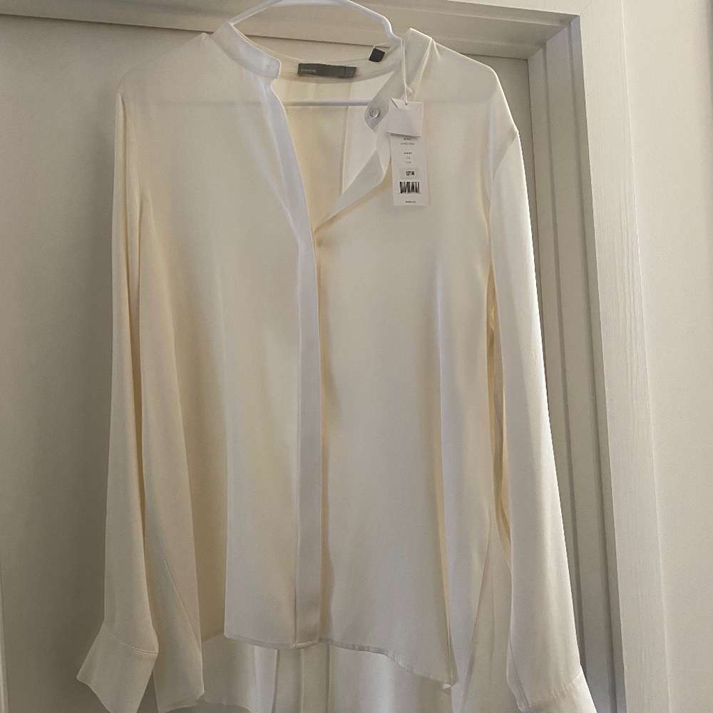 Creamy white colored Silk blouse with peekaboo back